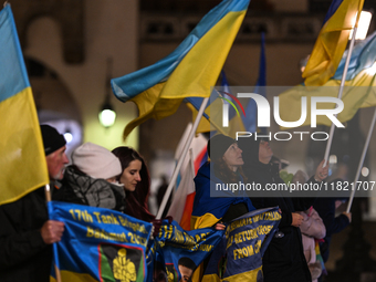 KRAKOW, POLAND - NOVEMBER 29:
On the evening of the 1010th day of Russia's invasion of Ukraine, a few members of the Ukrainian diaspora held...