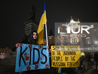 KRAKOW, POLAND - NOVEMBER 29:
On the evening of the 1010th day of Russia's invasion of Ukraine, a few members of the Ukrainian diaspora held...