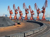 The coal transport train departs from the coal yard in Longkou Port Area, Yantai City, Shandong Province, China, on November 29, 2024. (