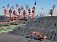 Loading machinery operates at the coal yard in Longkou Port Area, Yantai City, Shandong Province, China, on November 29, 2024. (