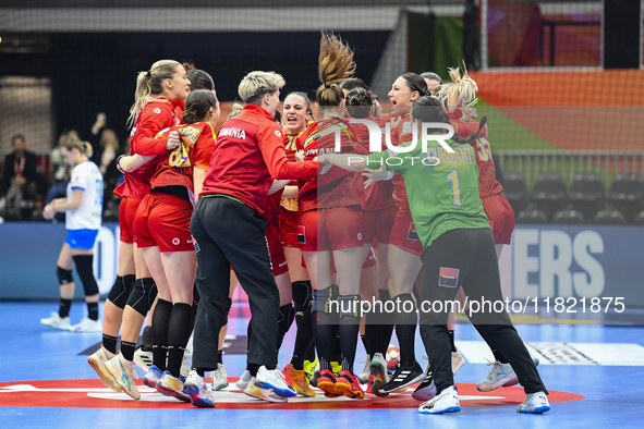 Players of Romania celebrate during the Romania vs. Czechia match at the Women's EHF EURO 2024 in Fonix Arena, Debrecen, on November 29, 202...