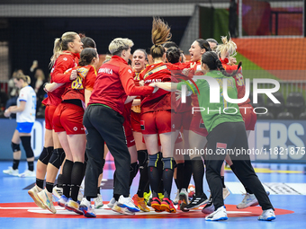 Players of Romania celebrate during the Romania vs. Czechia match at the Women's EHF EURO 2024 in Fonix Arena, Debrecen, on November 29, 202...