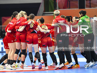 Players of Romania celebrate during the Romania vs. Czechia match at the Women's EHF EURO 2024 in Fonix Arena, Debrecen, on November 29, 202...