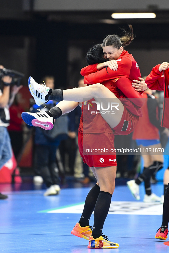 Players of Romania celebrate during the Romania vs. Czechia match at the Women's EHF EURO 2024 in Fonix Arena, Debrecen, on November 29, 202...