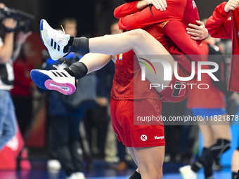 Players of Romania celebrate during the Romania vs. Czechia match at the Women's EHF EURO 2024 in Fonix Arena, Debrecen, on November 29, 202...