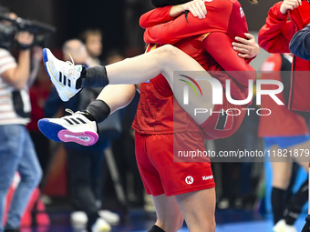 Players of Romania celebrate during the Romania vs. Czechia match at the Women's EHF EURO 2024 in Fonix Arena, Debrecen, on November 29, 202...