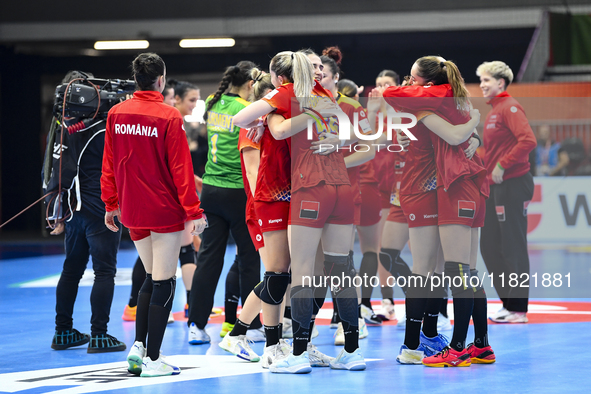 Players of Romania celebrate during the Romania vs. Czechia match at the Women's EHF EURO 2024 in Fonix Arena, Debrecen, on November 29, 202...