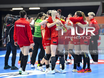 Players of Romania celebrate during the Romania vs. Czechia match at the Women's EHF EURO 2024 in Fonix Arena, Debrecen, on November 29, 202...