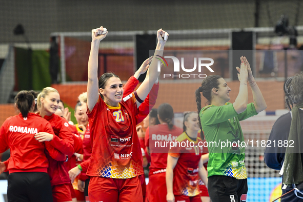 Players of Romania celebrate during the Romania vs. Czechia match at the Women's EHF EURO 2024 in Fonix Arena, Debrecen, on November 29, 202...