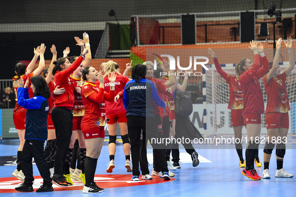 Players of Romania celebrate during the Romania vs. Czechia match at the Women's EHF EURO 2024 in Fonix Arena, Debrecen, on November 29, 202...