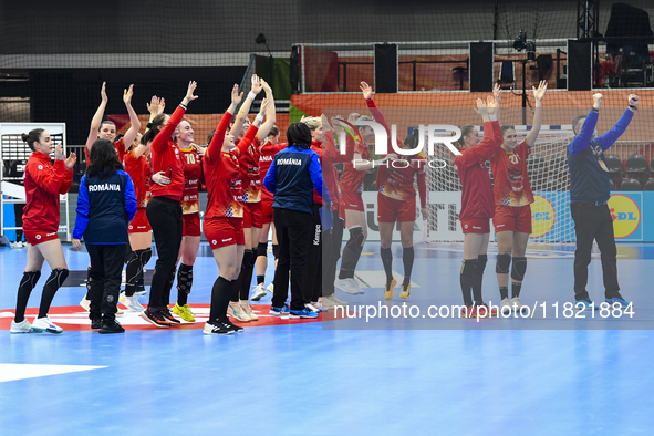 Players of Romania celebrate during the Romania vs. Czechia match at the Women's EHF EURO 2024 in Fonix Arena, Debrecen, on November 29, 202...