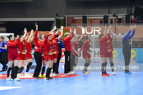 Players of Romania celebrate during the Romania vs. Czechia match at the Women's EHF EURO 2024 in Fonix Arena, Debrecen, on November 29, 202...