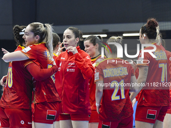 Players of Romania celebrate during the Romania vs. Czechia match at the Women's EHF EURO 2024 in Fonix Arena, Debrecen, on November 29, 202...