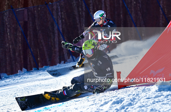 Mastnak Thiem of Slovenia competes during the first round of the men's snowboard parallel giant slalom at the 2024-2025 ISF Snowboard Parall...