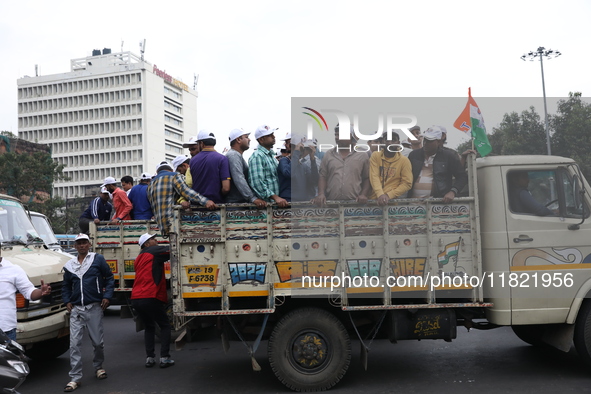 Activists from The All India Trinamool Congress take part in a protest meeting in Kolkata, India, on November 30, 2024, demanding the withdr...