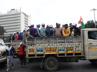 Activists from The All India Trinamool Congress take part in a protest meeting in Kolkata, India, on November 30, 2024, demanding the withdr...