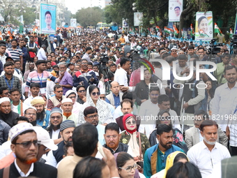 Activists from The All India Trinamool Congress take part in a protest meeting in Kolkata, India, on November 30, 2024, demanding the withdr...