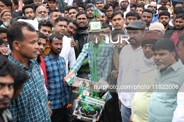 Activists from The All India Trinamool Congress take part in a protest meeting in Kolkata, India, on November 30, 2024, demanding the withdr...