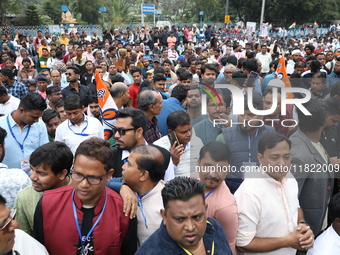 Activists from The All India Trinamool Congress take part in a protest meeting in Kolkata, India, on November 30, 2024, demanding the withdr...