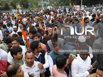 Activists from The All India Trinamool Congress take part in a protest meeting in Kolkata, India, on November 30, 2024, demanding the withdr...