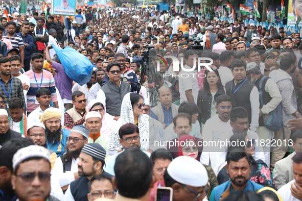 Activists from The All India Trinamool Congress take part in a protest meeting in Kolkata, India, on November 30, 2024, demanding the withdr...