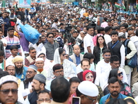 Activists from The All India Trinamool Congress take part in a protest meeting in Kolkata, India, on November 30, 2024, demanding the withdr...