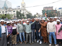 Activists from The All India Trinamool Congress take part in a protest meeting in Kolkata, India, on November 30, 2024, demanding the withdr...