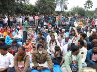 Activists from The All India Trinamool Congress take part in a protest meeting in Kolkata, India, on November 30, 2024, demanding the withdr...