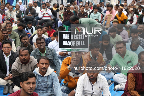 Activists from The All India Trinamool Congress take part in a protest meeting in Kolkata, India, on November 30, 2024, demanding the withdr...