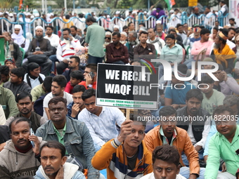 Activists from The All India Trinamool Congress take part in a protest meeting in Kolkata, India, on November 30, 2024, demanding the withdr...