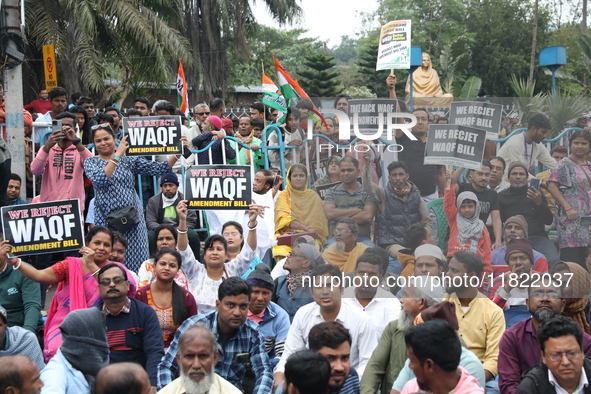 Activists from The All India Trinamool Congress take part in a protest meeting in Kolkata, India, on November 30, 2024, demanding the withdr...