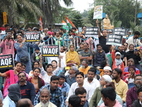 Activists from The All India Trinamool Congress take part in a protest meeting in Kolkata, India, on November 30, 2024, demanding the withdr...