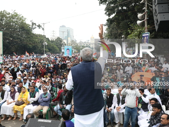 Activists from The All India Trinamool Congress take part in a protest meeting in Kolkata, India, on November 30, 2024, demanding the withdr...