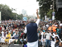 Activists from The All India Trinamool Congress take part in a protest meeting in Kolkata, India, on November 30, 2024, demanding the withdr...