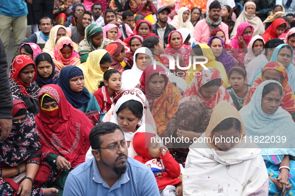 Activists from The All India Trinamool Congress take part in a protest meeting in Kolkata, India, on November 30, 2024, demanding the withdr...