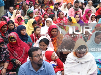 Activists from The All India Trinamool Congress take part in a protest meeting in Kolkata, India, on November 30, 2024, demanding the withdr...