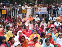 Activists from The All India Trinamool Congress take part in a protest meeting in Kolkata, India, on November 30, 2024, demanding the withdr...