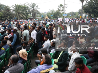 Activists from The All India Trinamool Congress take part in a protest meeting in Kolkata, India, on November 30, 2024, demanding the withdr...