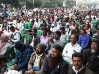 Activists from The All India Trinamool Congress take part in a protest meeting in Kolkata, India, on November 30, 2024, demanding the withdr...