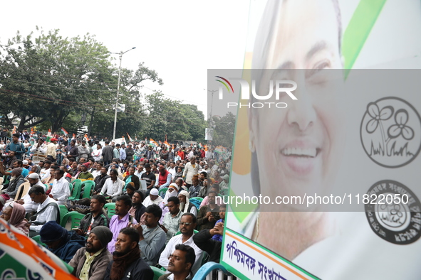 Activists from The All India Trinamool Congress take part in a protest meeting in Kolkata, India, on November 30, 2024, demanding the withdr...