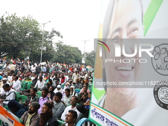 Activists from The All India Trinamool Congress take part in a protest meeting in Kolkata, India, on November 30, 2024, demanding the withdr...