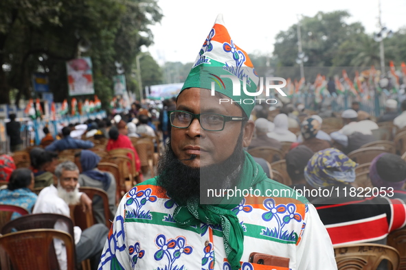 Activists from The All India Trinamool Congress take part in a protest meeting in Kolkata, India, on November 30, 2024, demanding the withdr...