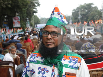 Activists from The All India Trinamool Congress take part in a protest meeting in Kolkata, India, on November 30, 2024, demanding the withdr...