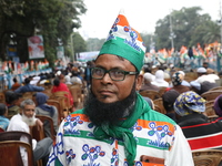 Activists from The All India Trinamool Congress take part in a protest meeting in Kolkata, India, on November 30, 2024, demanding the withdr...