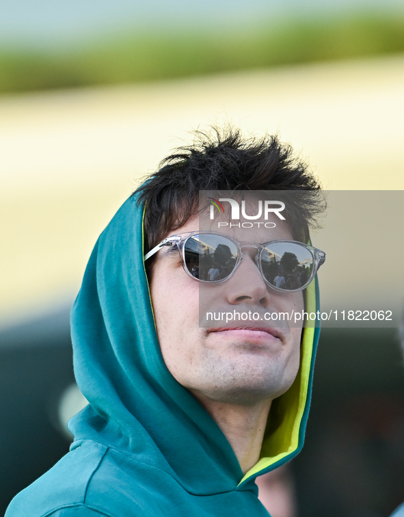 Canadian Formula One driver Lance Stroll of Aston Martin walks through the paddock as he arrives ahead of the Formula 1 Grand Prix of Qatar...