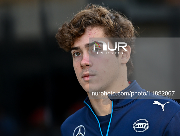 Argentinian Formula One driver Franco Colapinto of Williams walks through the paddock as he arrives ahead of the Formula 1 Grand Prix of Qat...