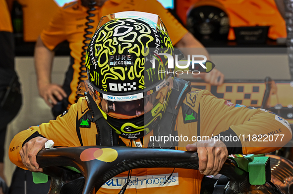 British driver Lando Norris of McLaren Mercedes prepares to drive during the first practice session of the Formula 1 Grand Prix of Qatar at...