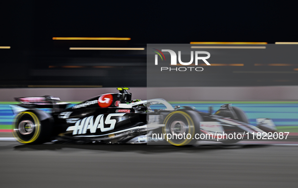 Danish Formula One driver Kevin Magnussen of Haas participates in the first practice session of the Formula 1 Grand Prix of Qatar at Lusail...