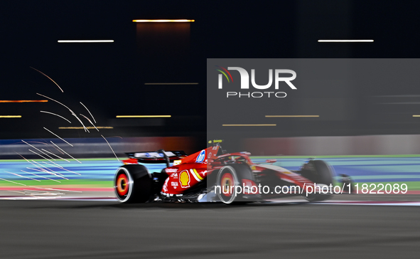 Spanish Formula One driver Carlos Sainz of Ferrari participates in the first practice session of the Formula 1 Grand Prix of Qatar at Lusail...