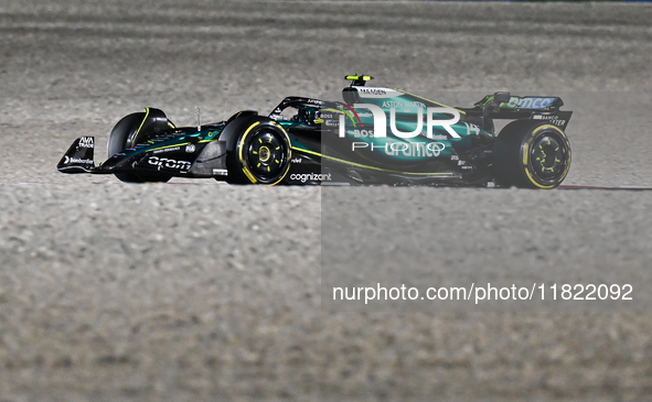 Spanish Formula One driver Fernando Alonso drives for Aston Martin during the first practice session of the Formula 1 Grand Prix of Qatar at...